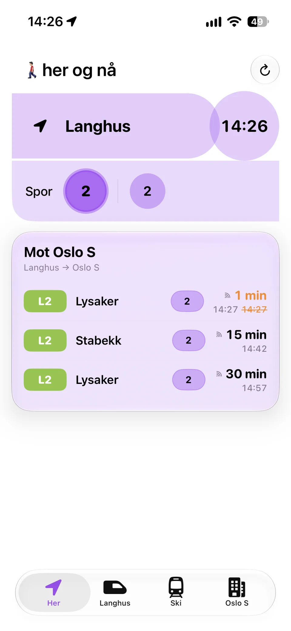 På tide i lyst tema med kommende avganger fra Langhus, spor og minutter til avgang.